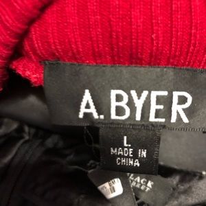 Houndstooth pencil skirt with red sweater.